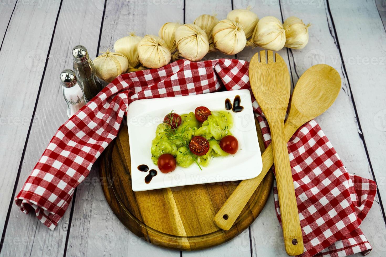 Cucumber salad with herbs ans spices photo