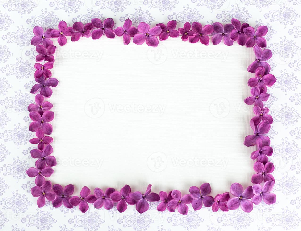 Background with copy space blank on table with lilac purple flower. photo