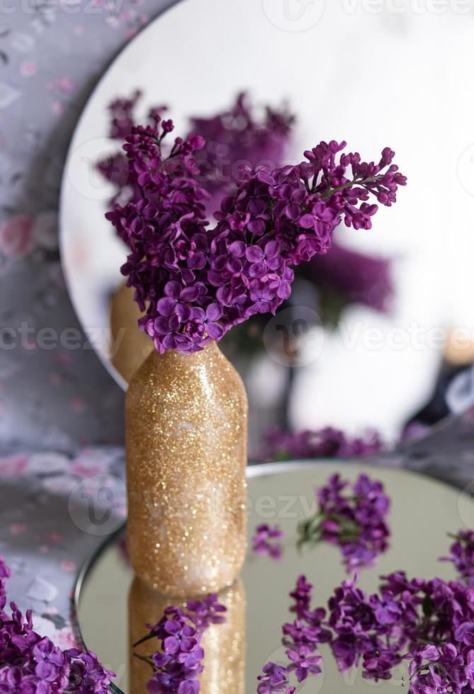 Background with copy space blank on table with lilac purple flower. photo