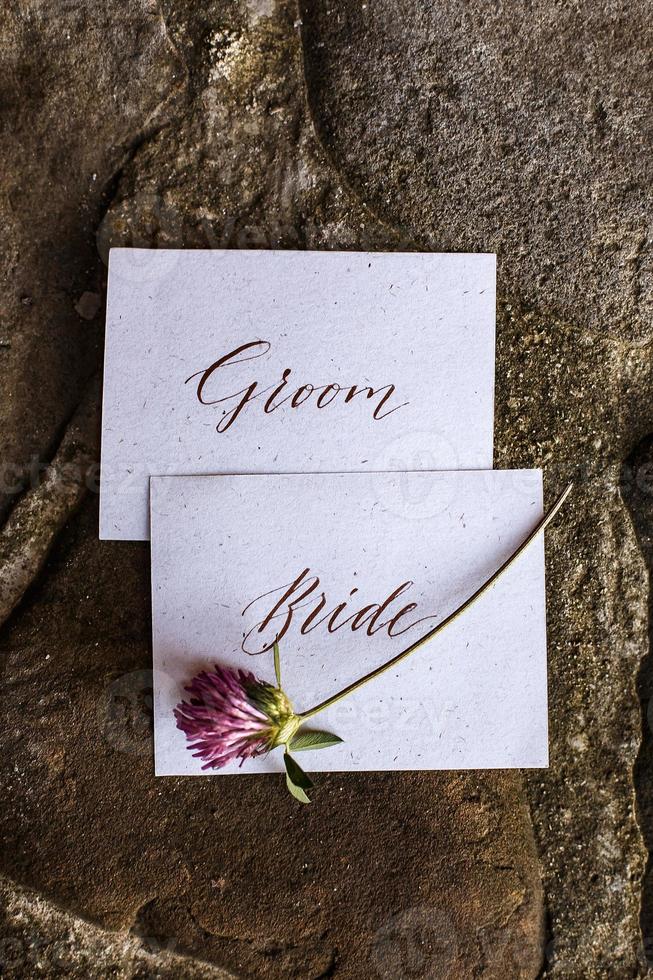 Wedding details flat lay. Wedding invitation. Mock up. Clover. photo