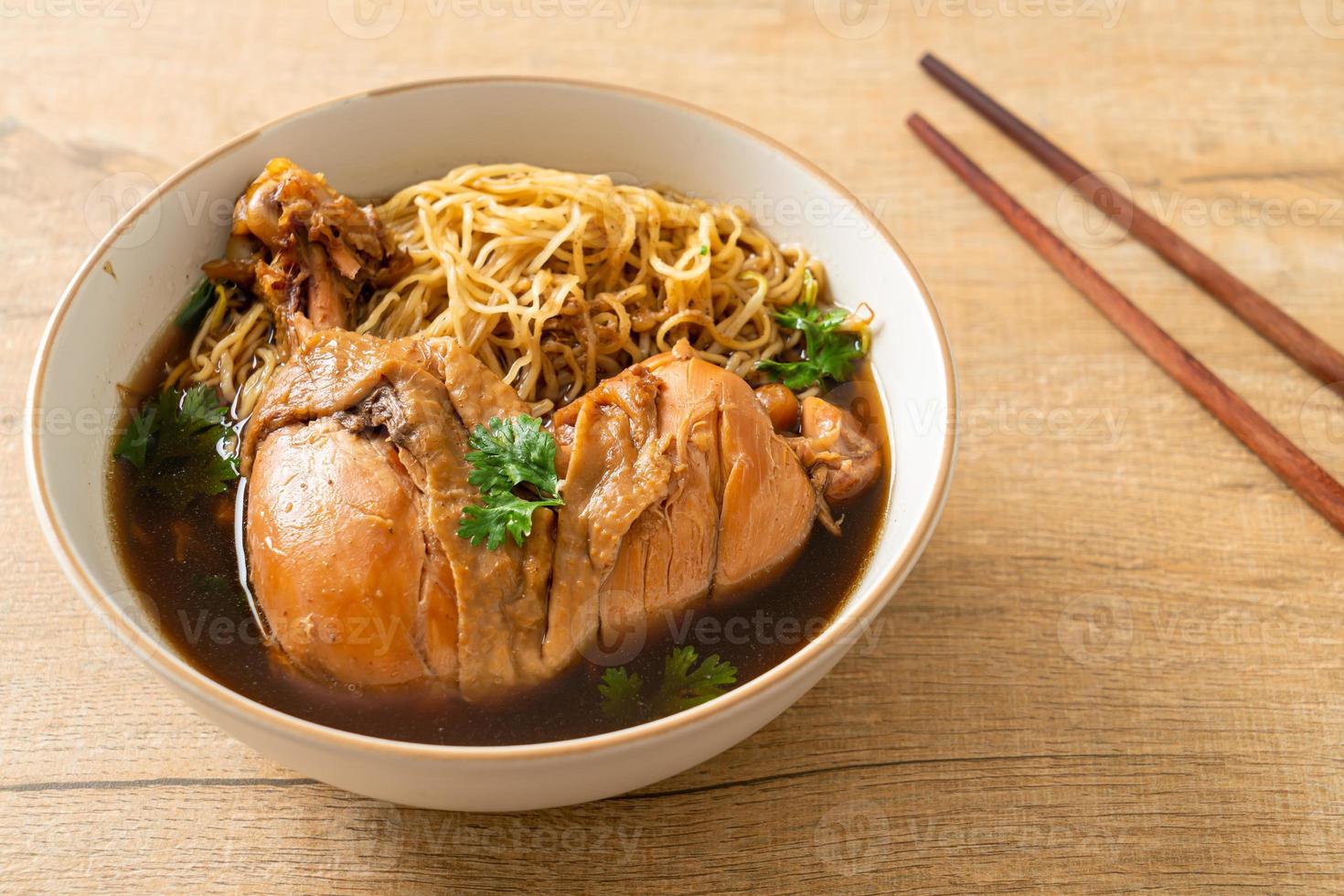 Noodles with Braised Chicken in Brown Soup photo