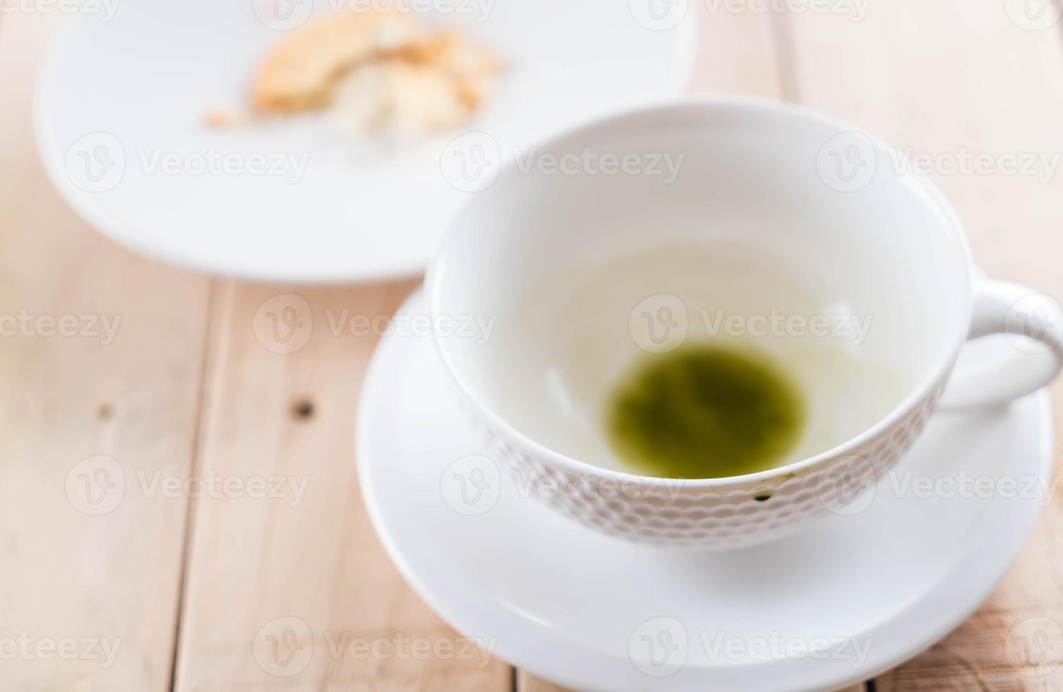 Empty cup of matcha latte green tea photo