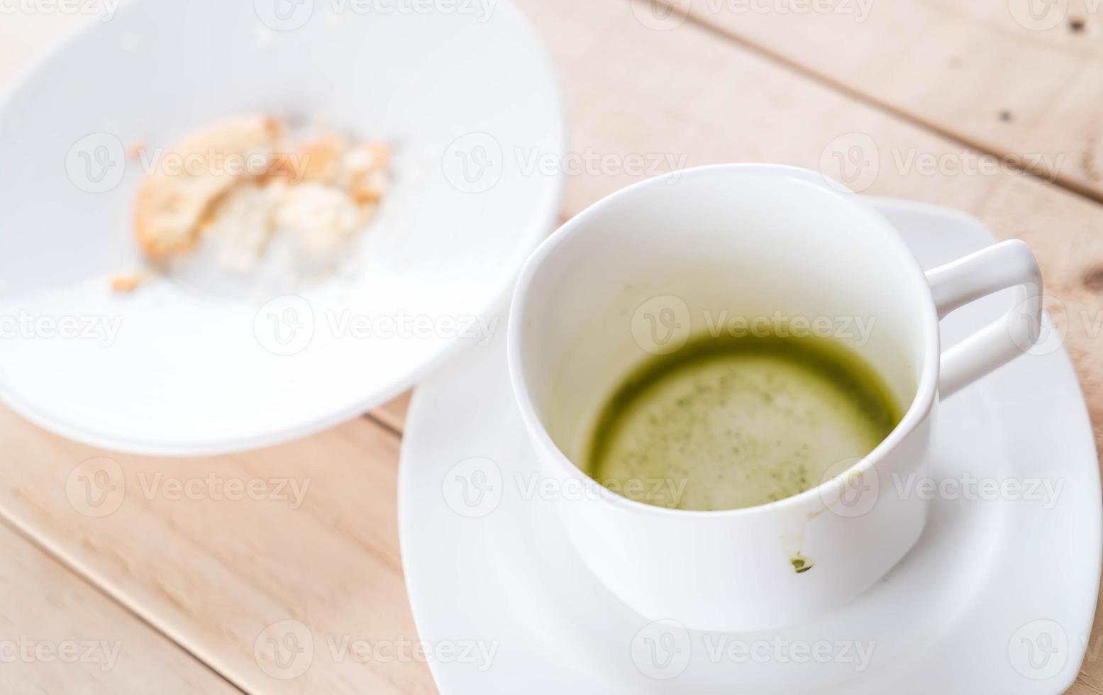 Empty cup of matcha latte green tea photo