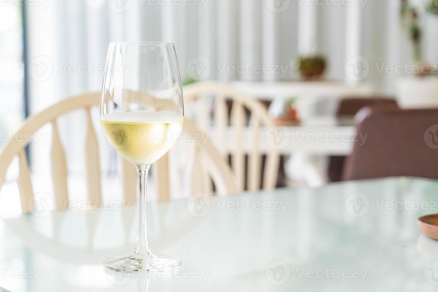 A glass of sparking wine in restaurant photo