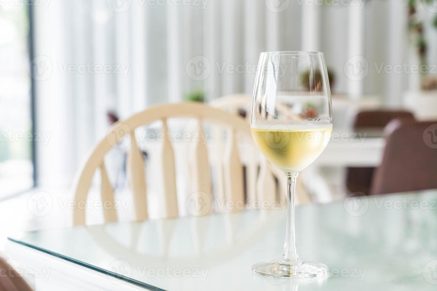 A glass of sparking wine in restaurant photo