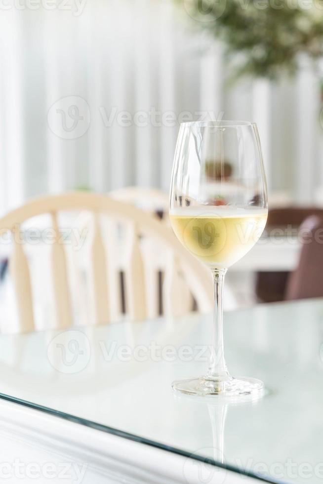 A glass of sparking wine in restaurant photo