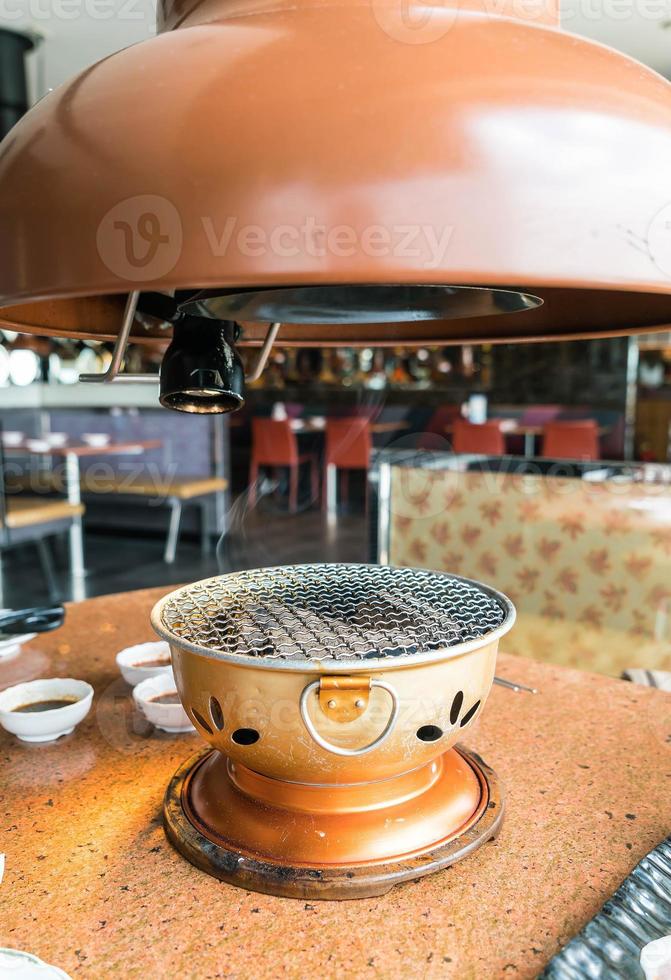 Empty charcoal grill - Korean style photo