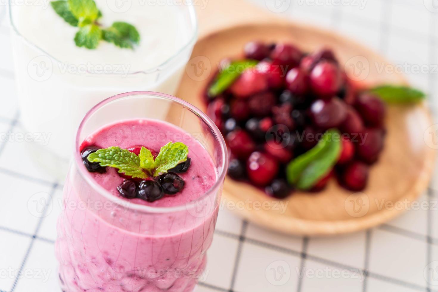 Mixed berries with yogurt smoothies on the table photo