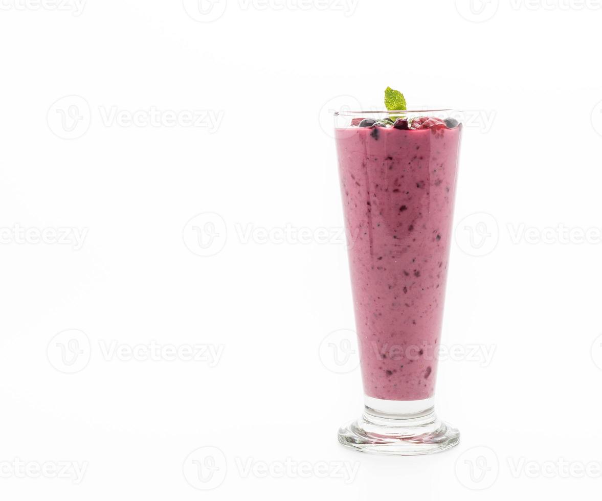 Mixed berries with yogurt smoothies on white background photo