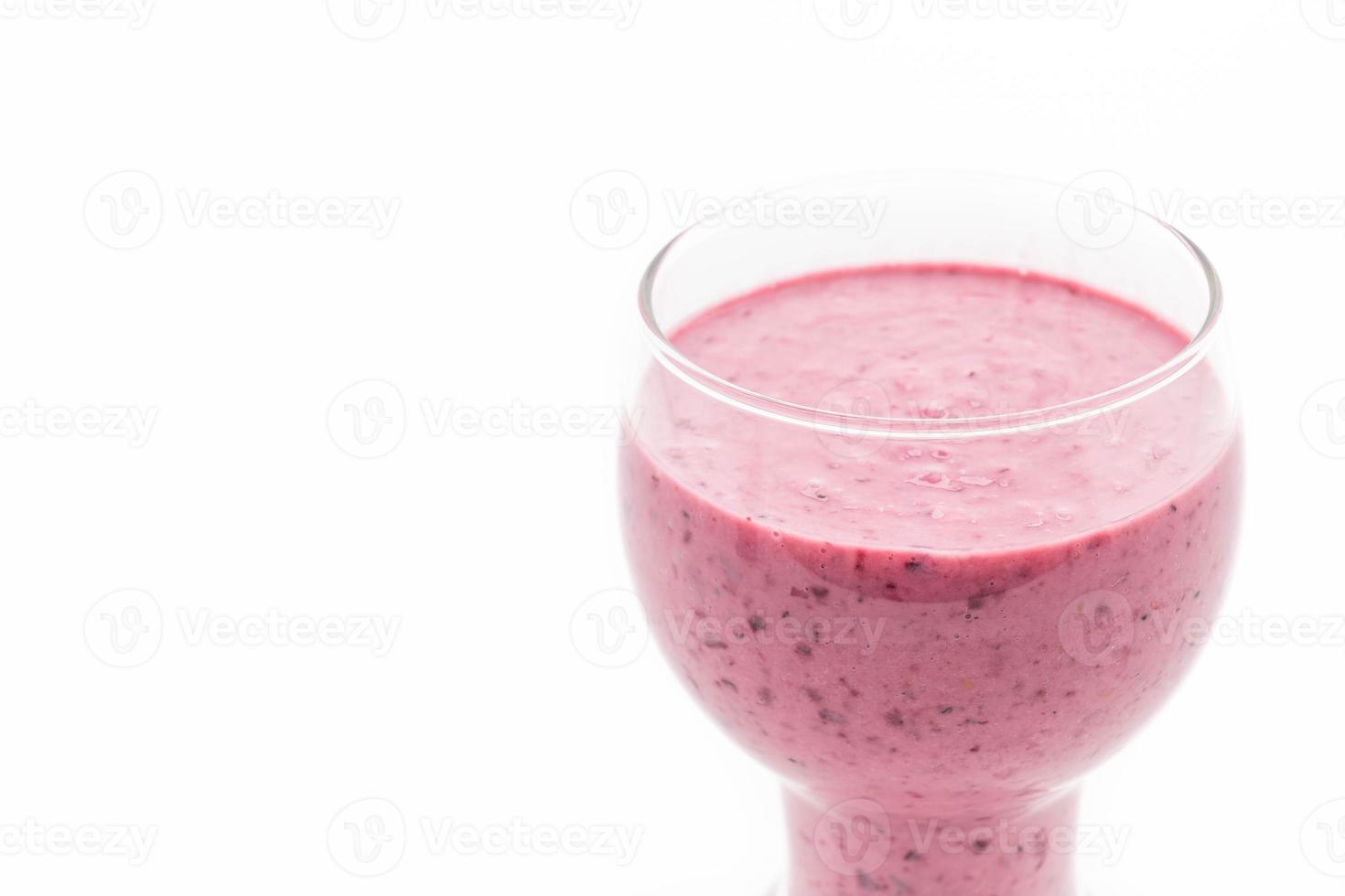 Mixed berries with yogurt smoothies on white background photo