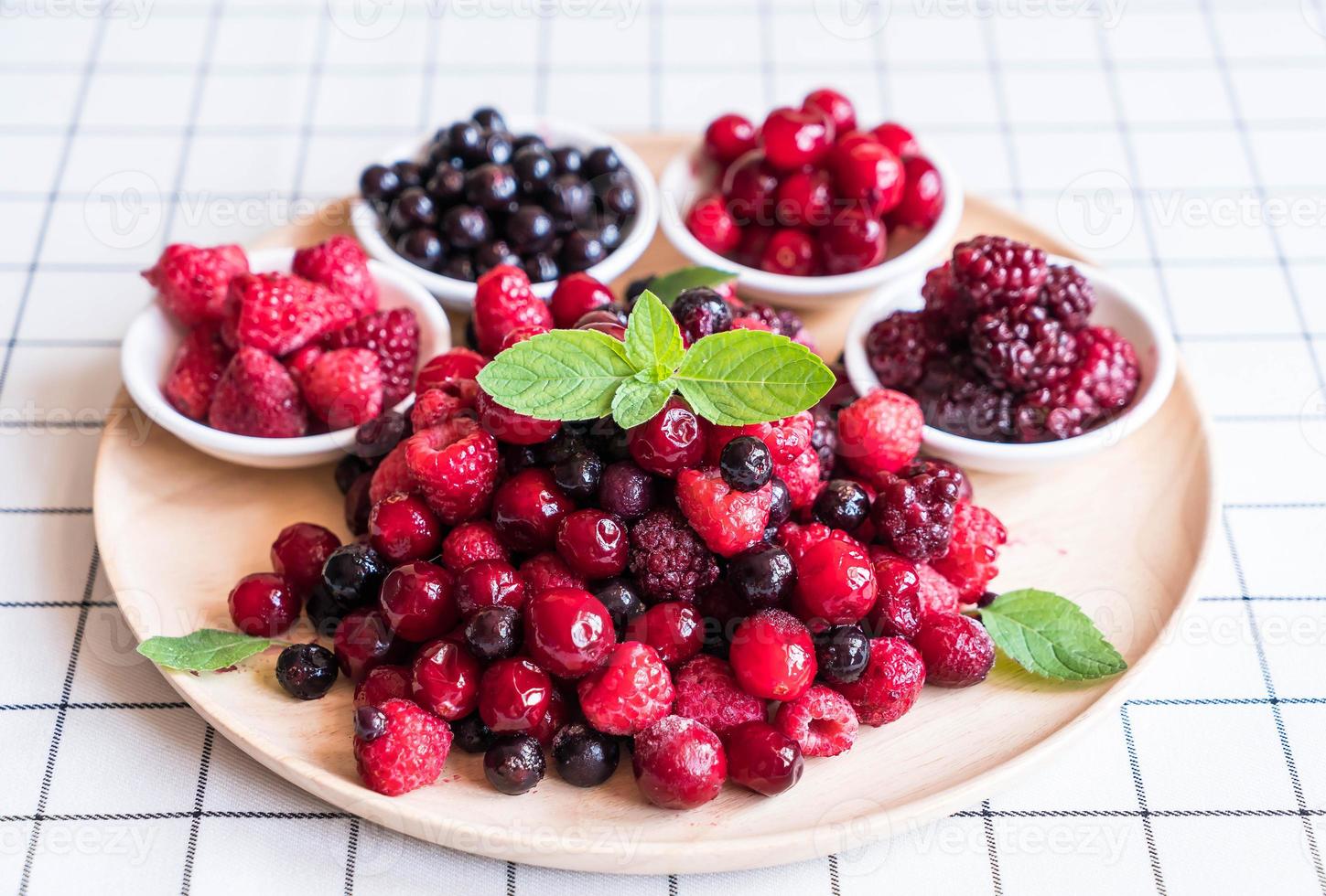 Frozen mixed berry on the table photo