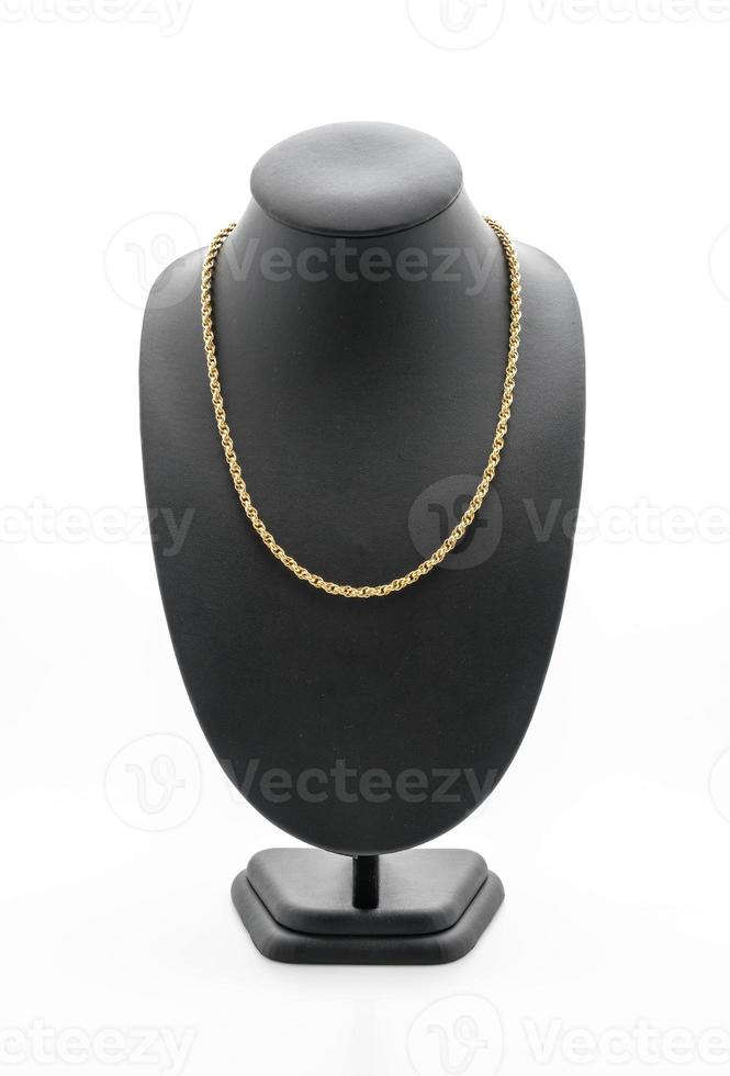 Beautiful and luxury necklace with jewelry stand neck on white photo