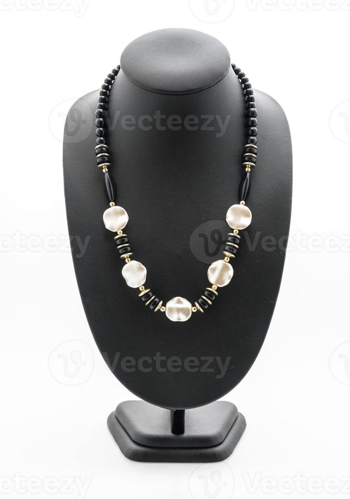 Collar hermoso y de lujo con cuello de soporte de joyería en blanco foto