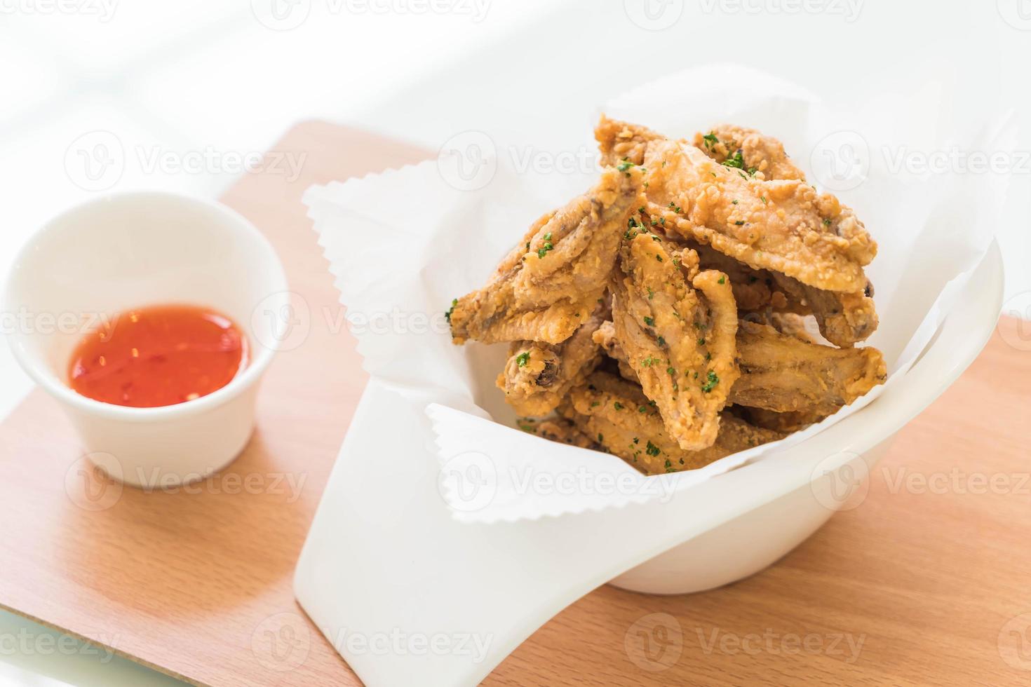 Fried chicken wings with sauce photo