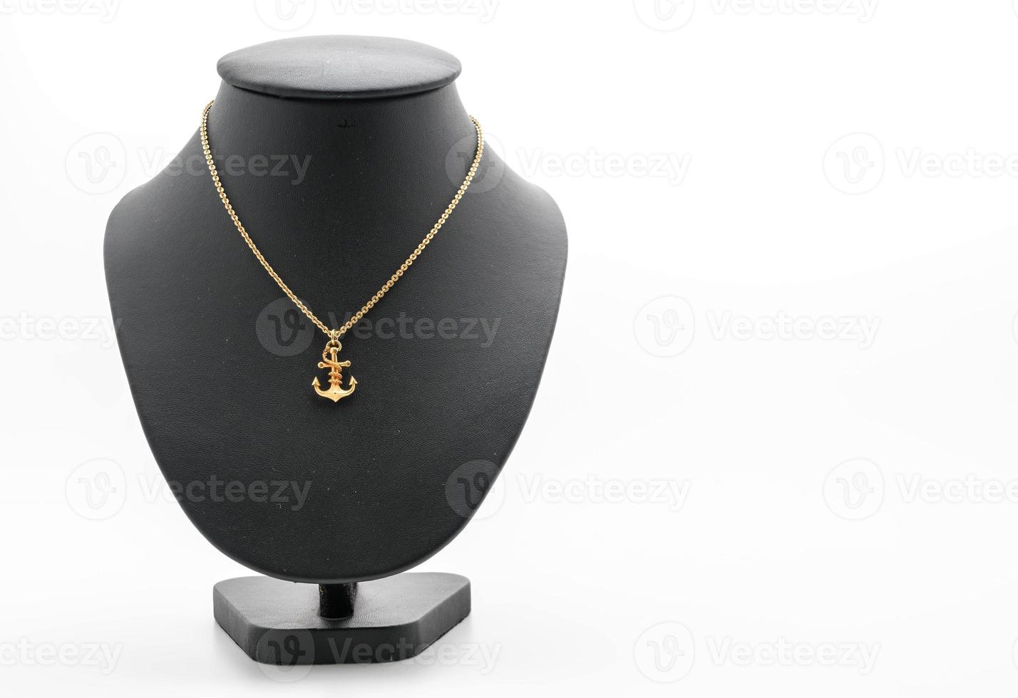 Beautiful and luxury necklace with jewelry stand neck on white photo