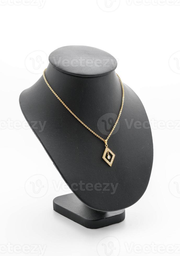 Beautiful and luxury necklace with jewelry stand neck on white photo