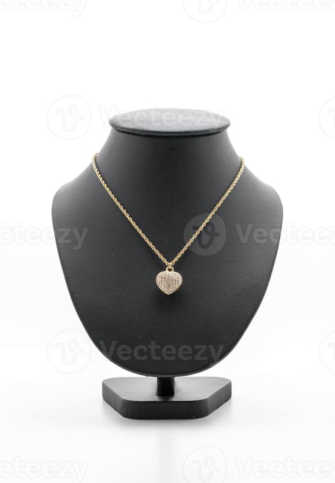 Beautiful and luxury necklace with jewelry stand neck on white photo