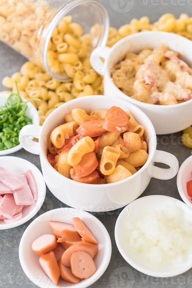 Macaroni cheese and ham on the table photo