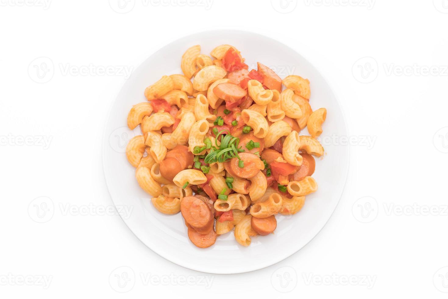 Macaroni with sausage on white background photo