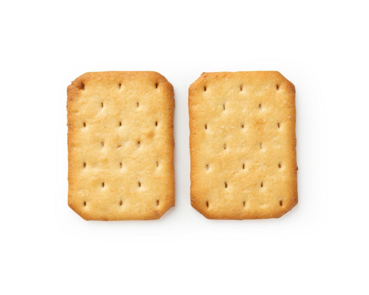 Galletas cracker aislado sobre fondo blanco con trazado de recorte foto