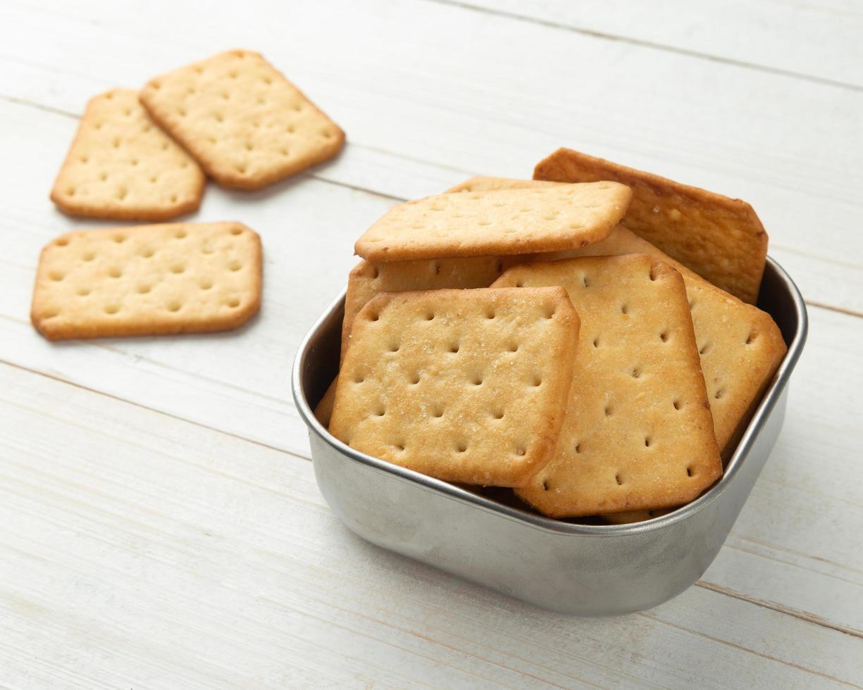 Cracker cookies on wooden table background photo