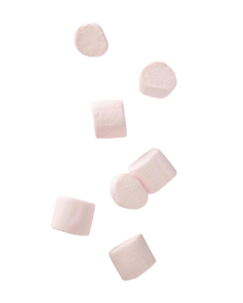 Marshmallow falling isolated on white background with clipping path photo