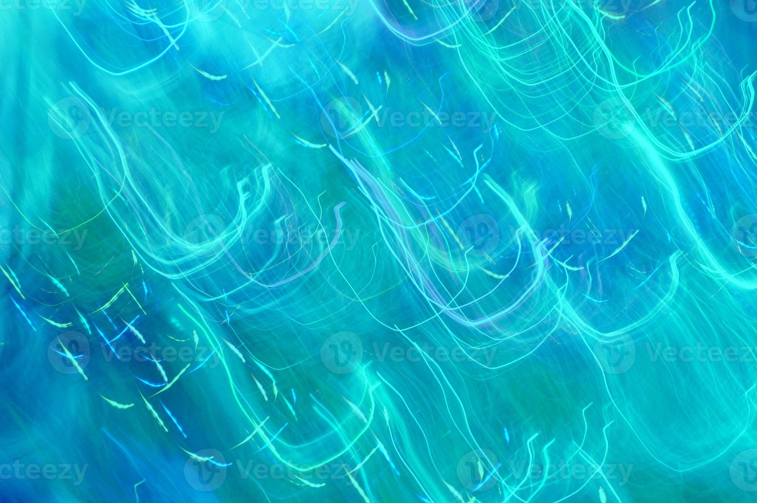 Abstract background of lights glowing blue with colorful strokes photo