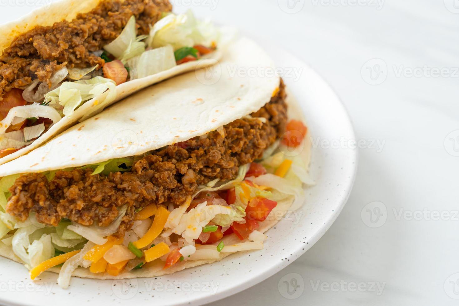 Mexican tacos with minced chicken photo