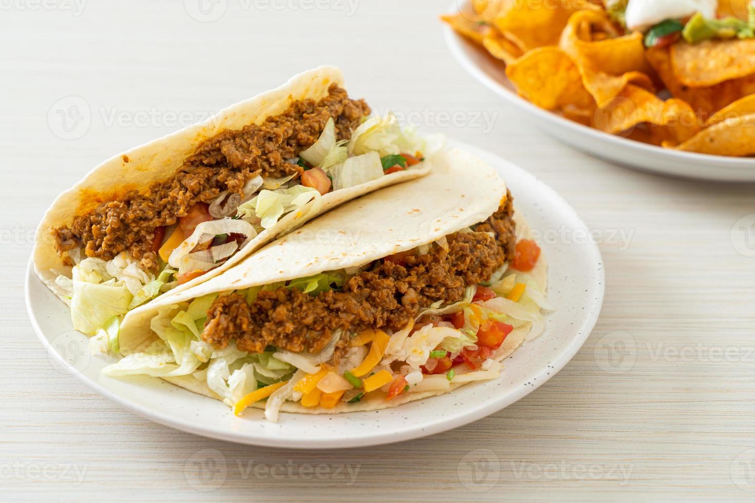 Mexican tacos with minced chicken photo