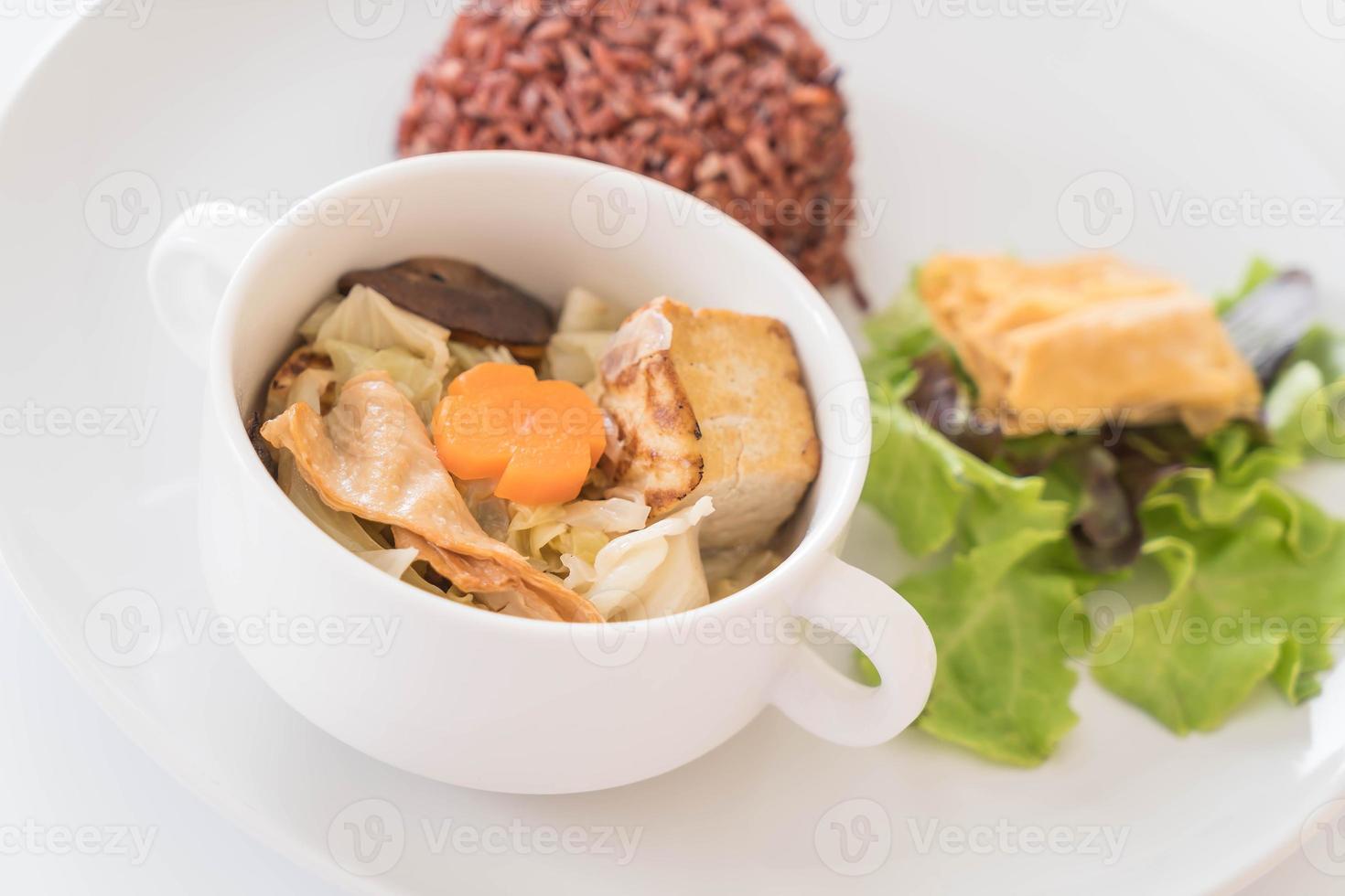 Stuffed cabbage soup with berry rice and tofu photo