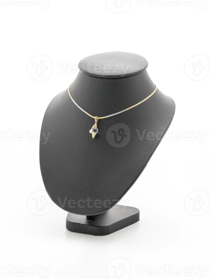 Beautiful and luxury necklace with jewelry stand neck on white background photo