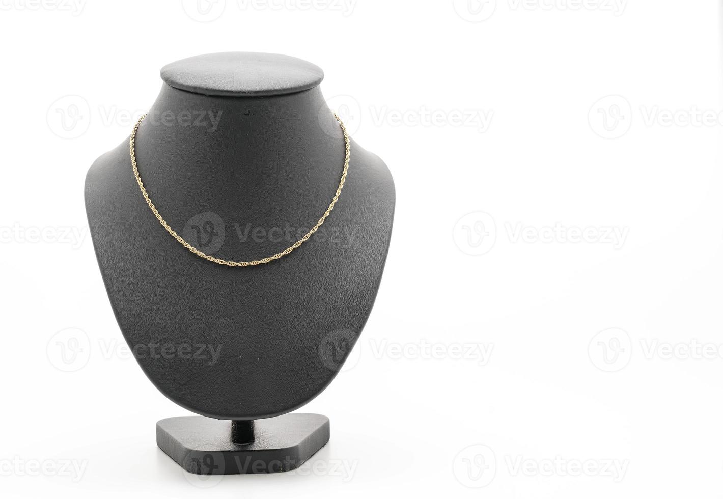 Beautiful and luxury necklace with jewelry stand neck on white background photo