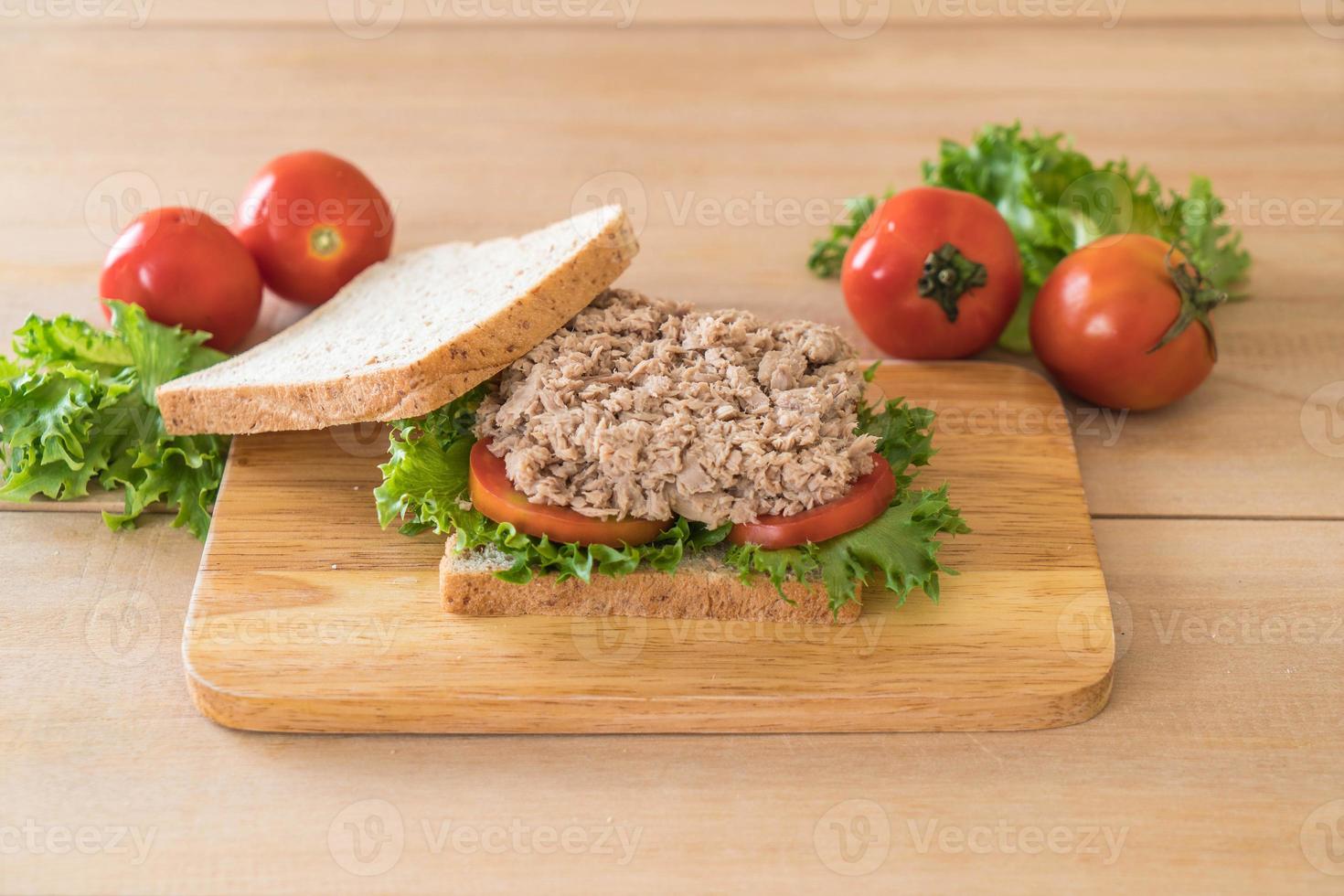 Tuna sandwich on wood board photo