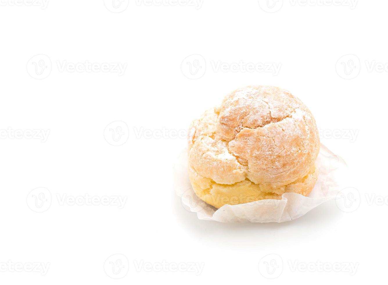 Cream puff on white background photo