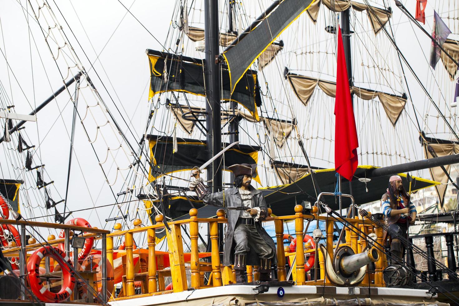 A Pirate Ship and Pirate Statue photo