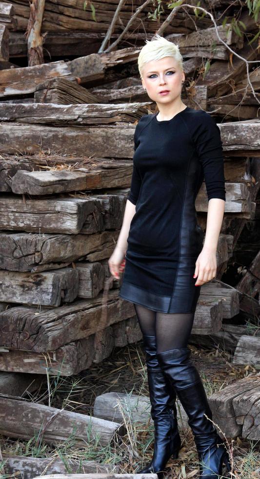Cut Woods Trunk and Blond Woman photo
