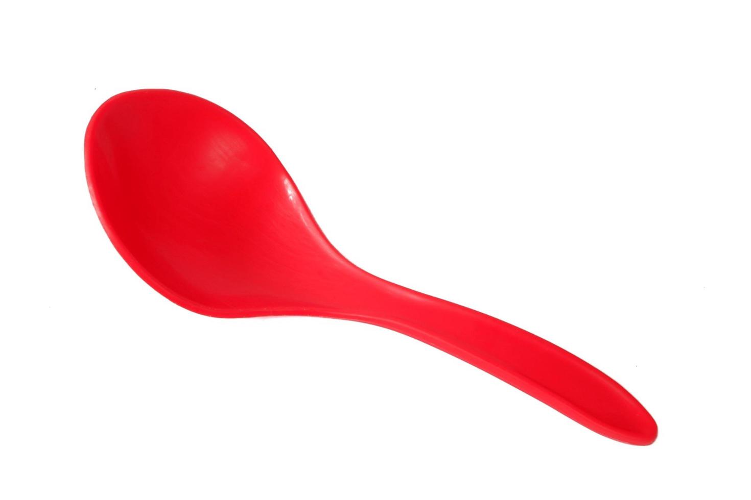 Rice spoon isolated on a white background photo