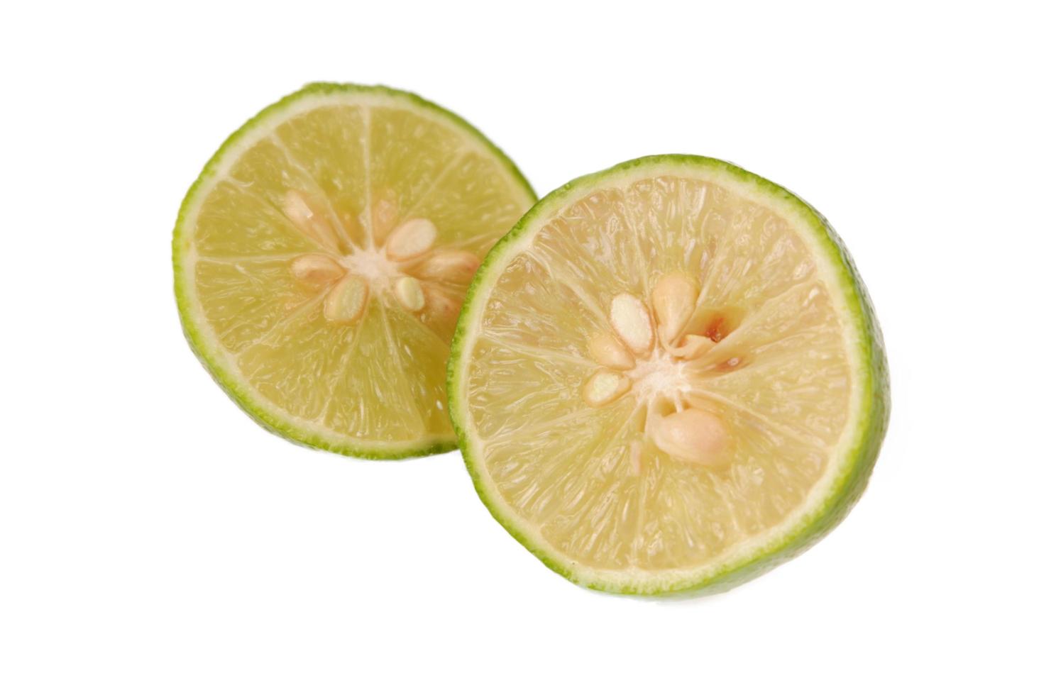 Sliced lime isolated on white background photo
