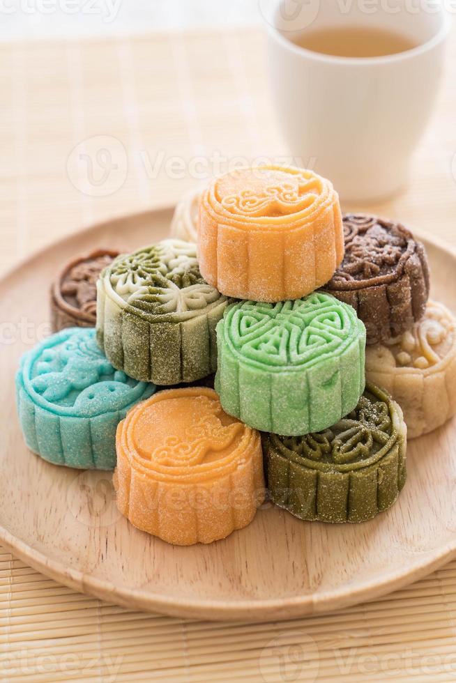 Fresh moon cake on wood plate photo