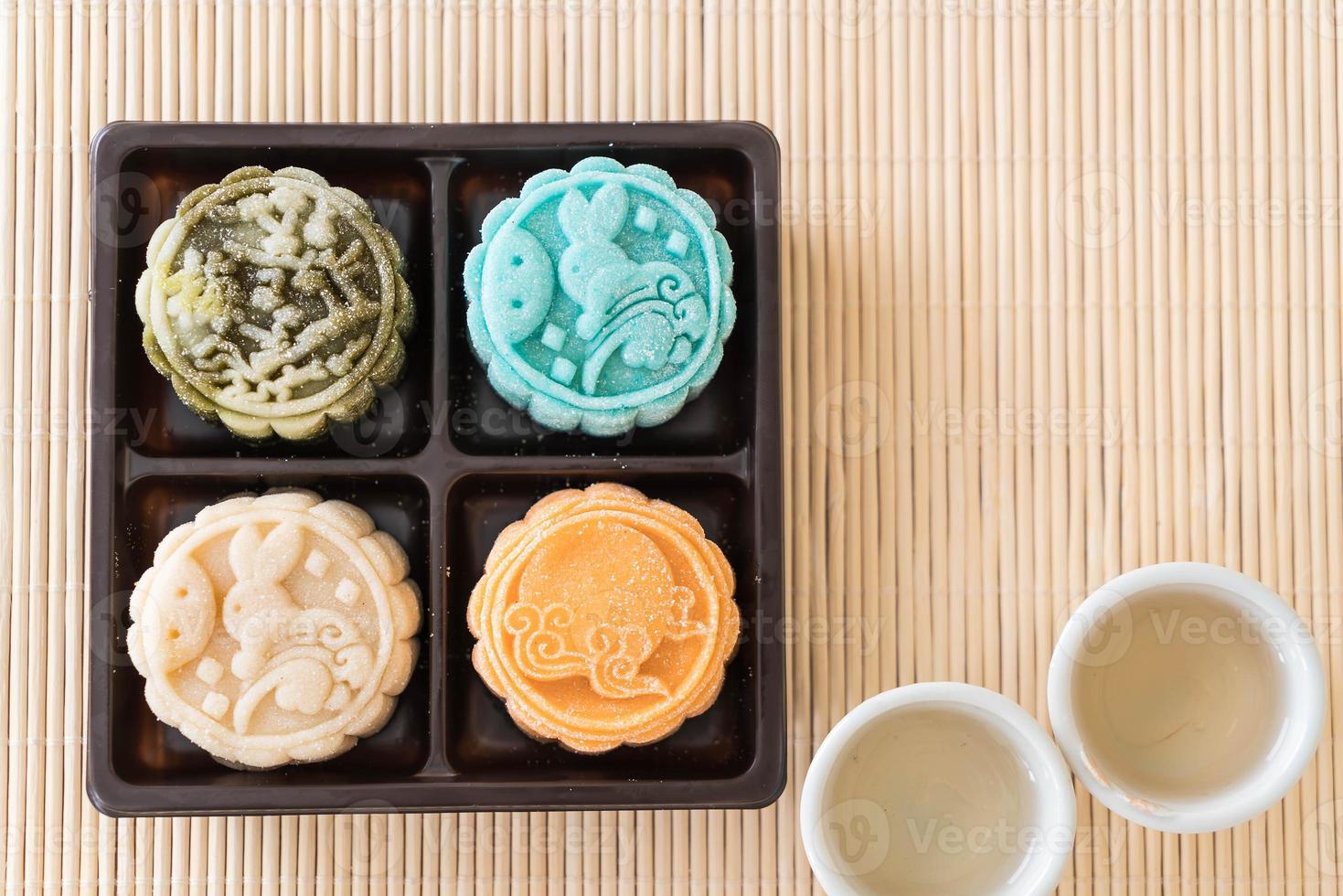 Fresh moon cake on wood plate photo