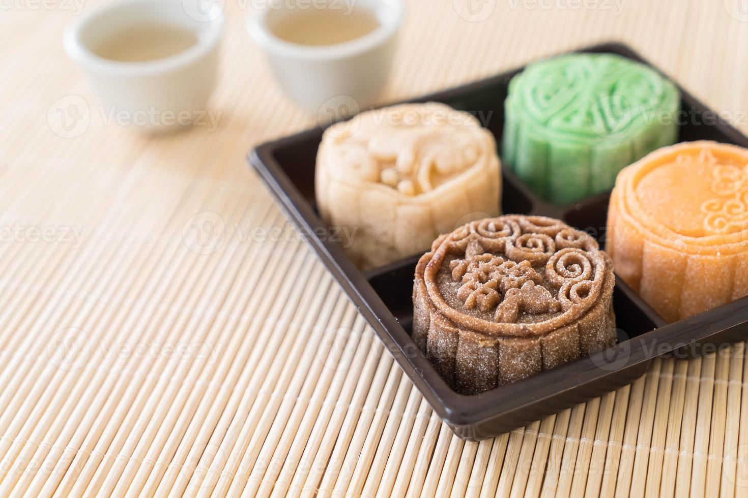 Fresh moon cake on wood plate photo