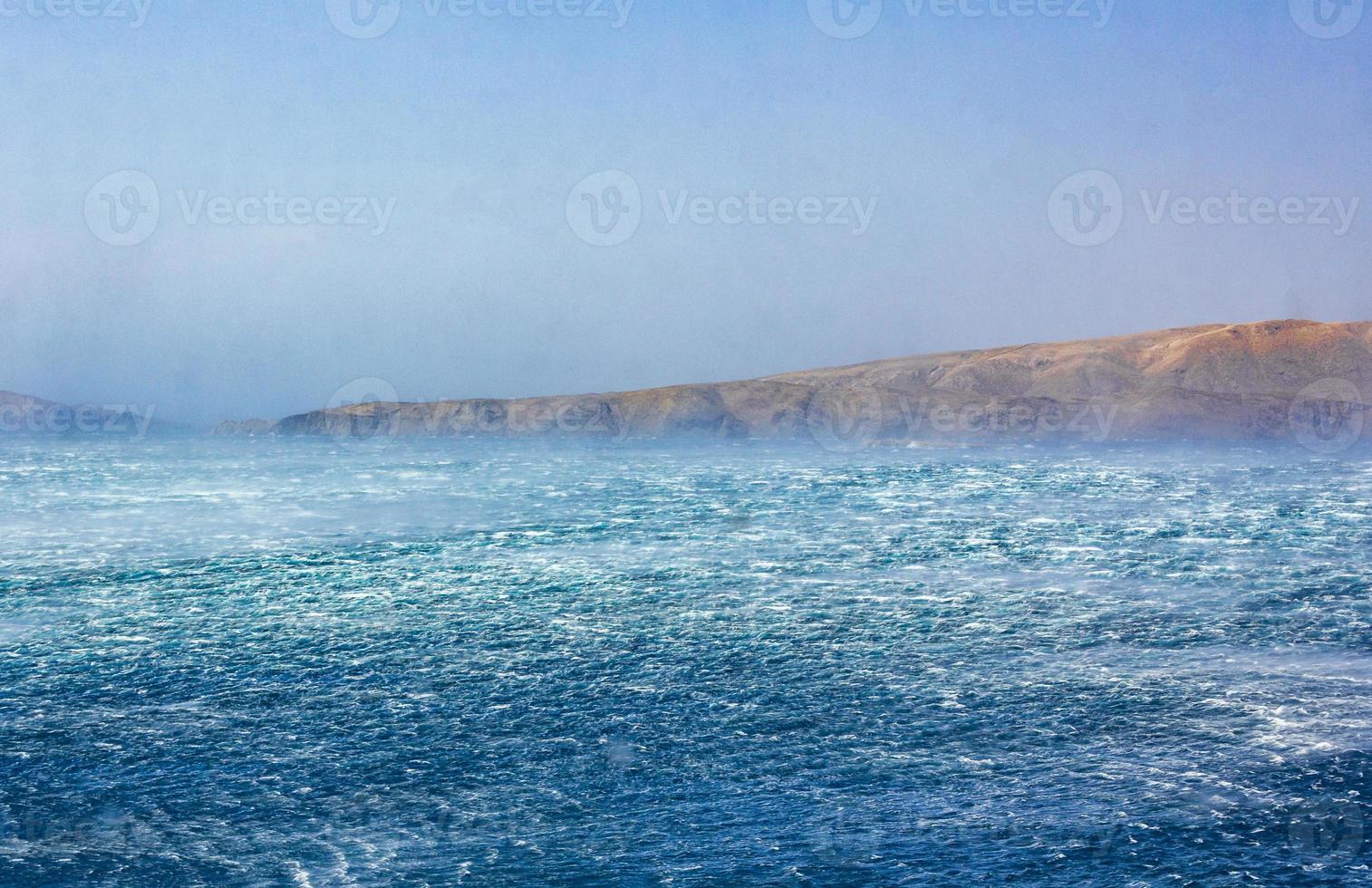 Rough blue seas with strong wind in Novi Vinodolski Croatia. photo