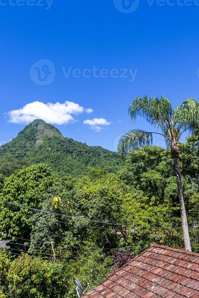 Abraao mountain Pico do Papagaio with clouds. Ilha Grande Brazil. photo