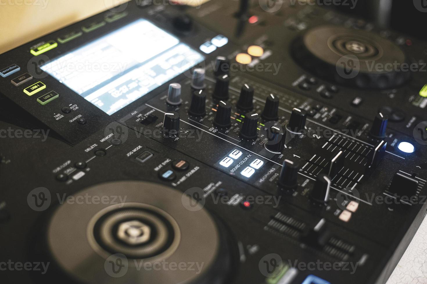 Control panel used by the DJ to mix live music photo