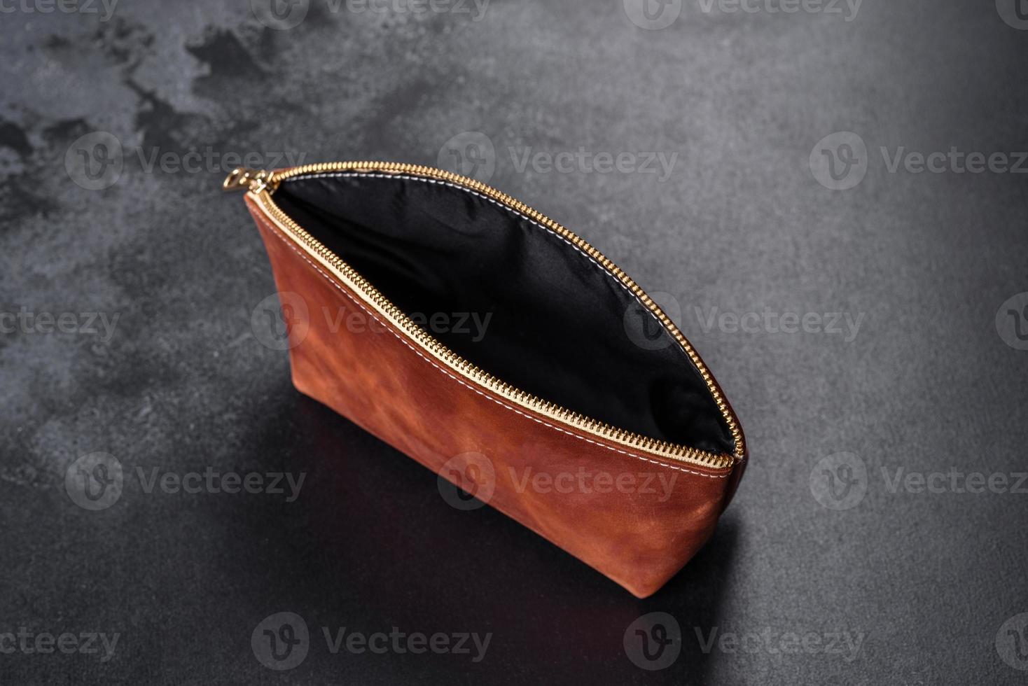 Beautiful leather brown purse made of leather to store paper money photo