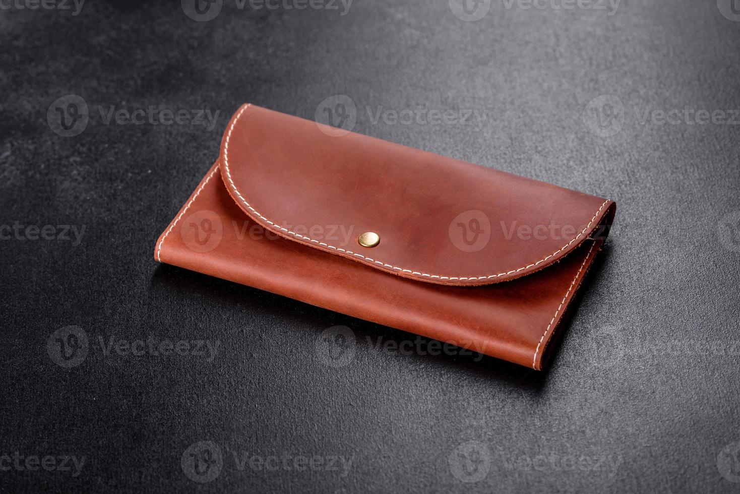 Beautiful leather brown purse made of leather to store paper money photo