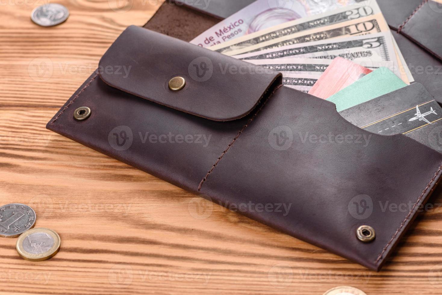 Beautiful leather brown purse made of leather to store paper money photo