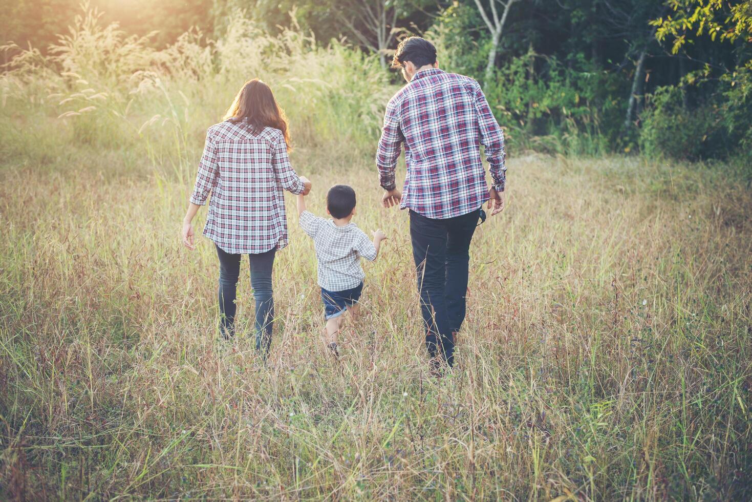 Happy young family spending time together outside. Family love concept photo