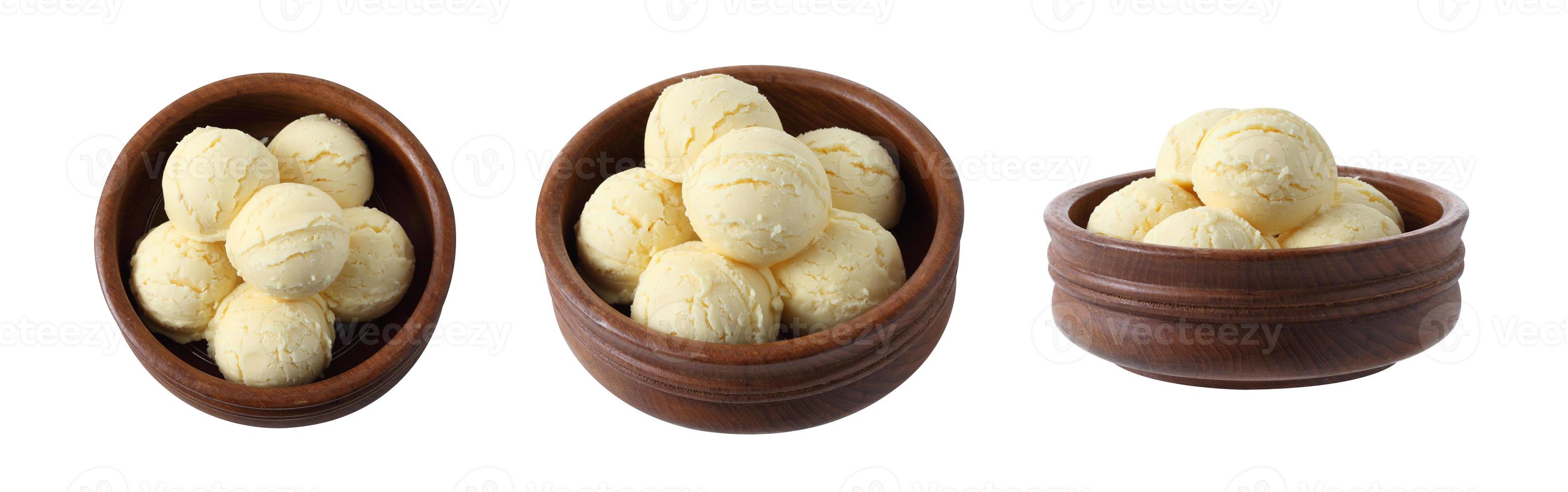 Vanilla ice cream in wooden cup on white background photo