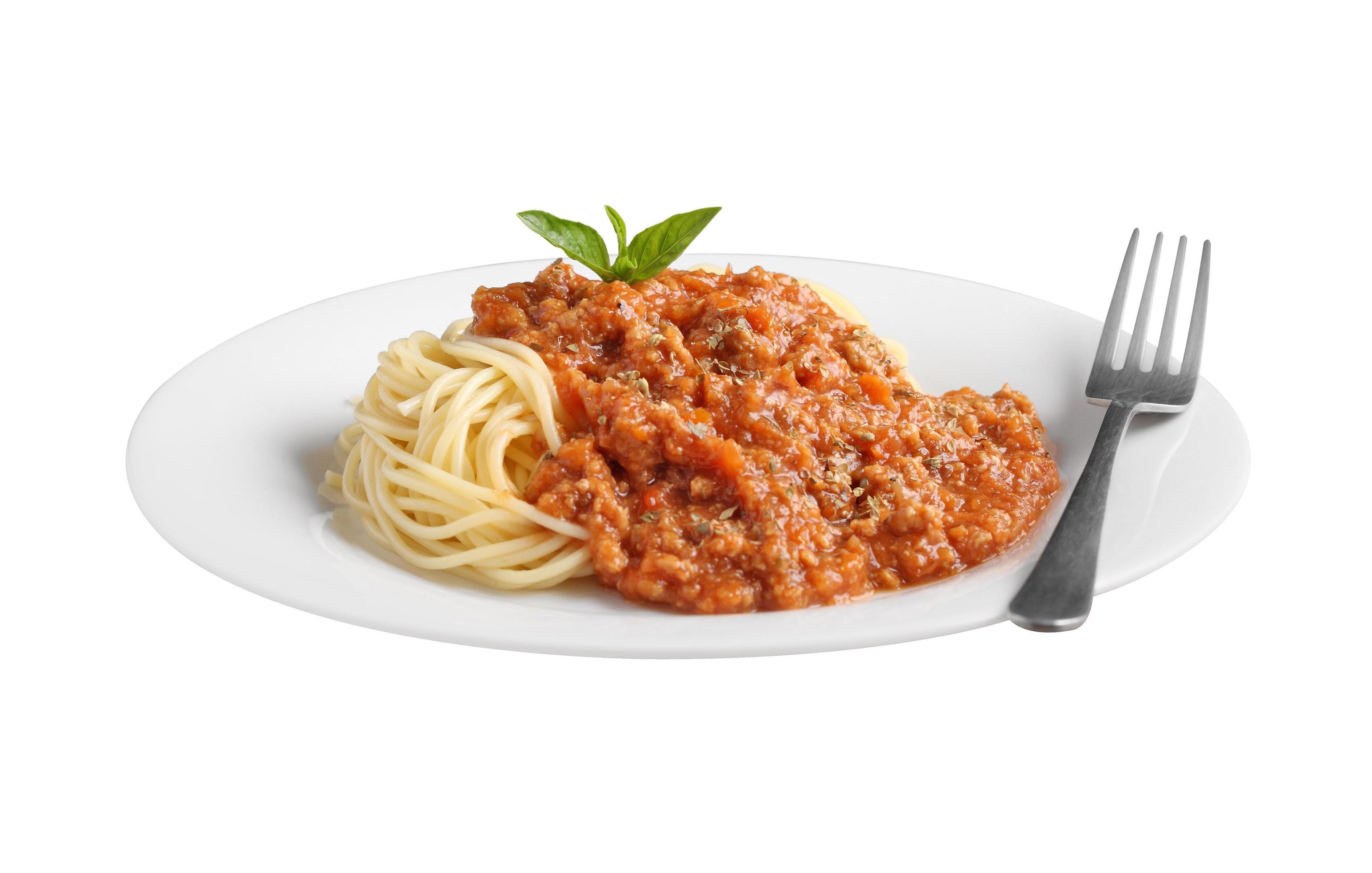 Close up a spaghetti and red sauce in white dish on white background